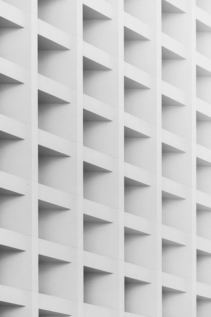 white concrete building facade pattern