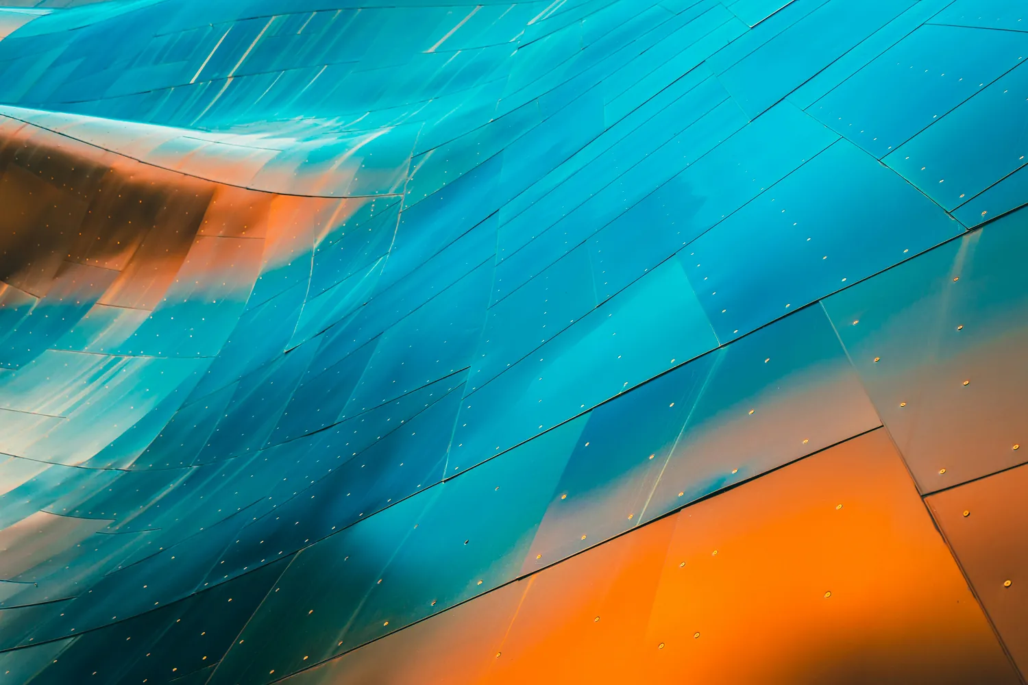 Panels of blue and orange metal welded together